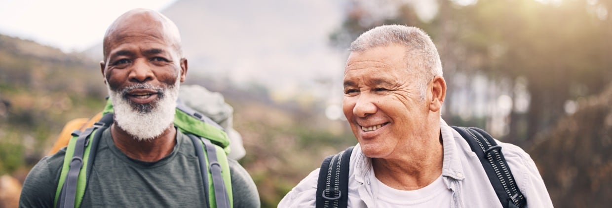 Two older men hiking